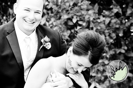 bride and groom laughing