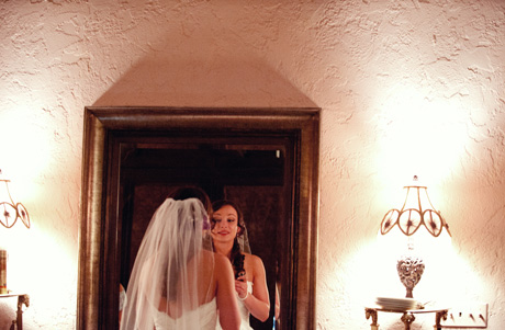 bride looking in the mirror