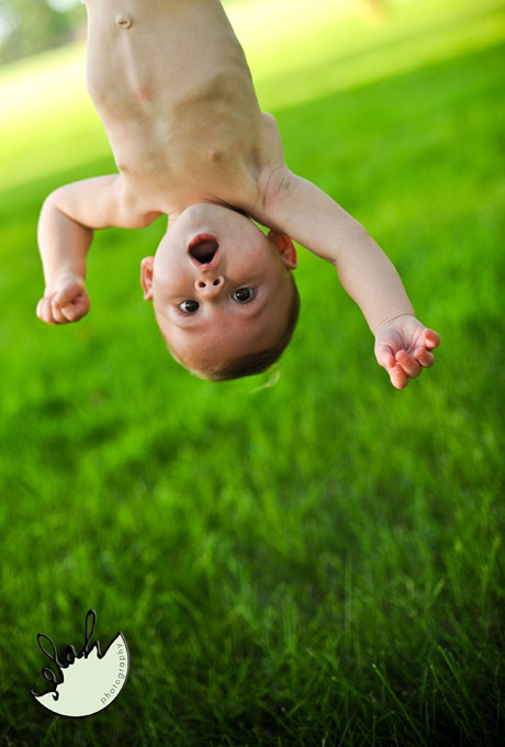 baby hanging upside down